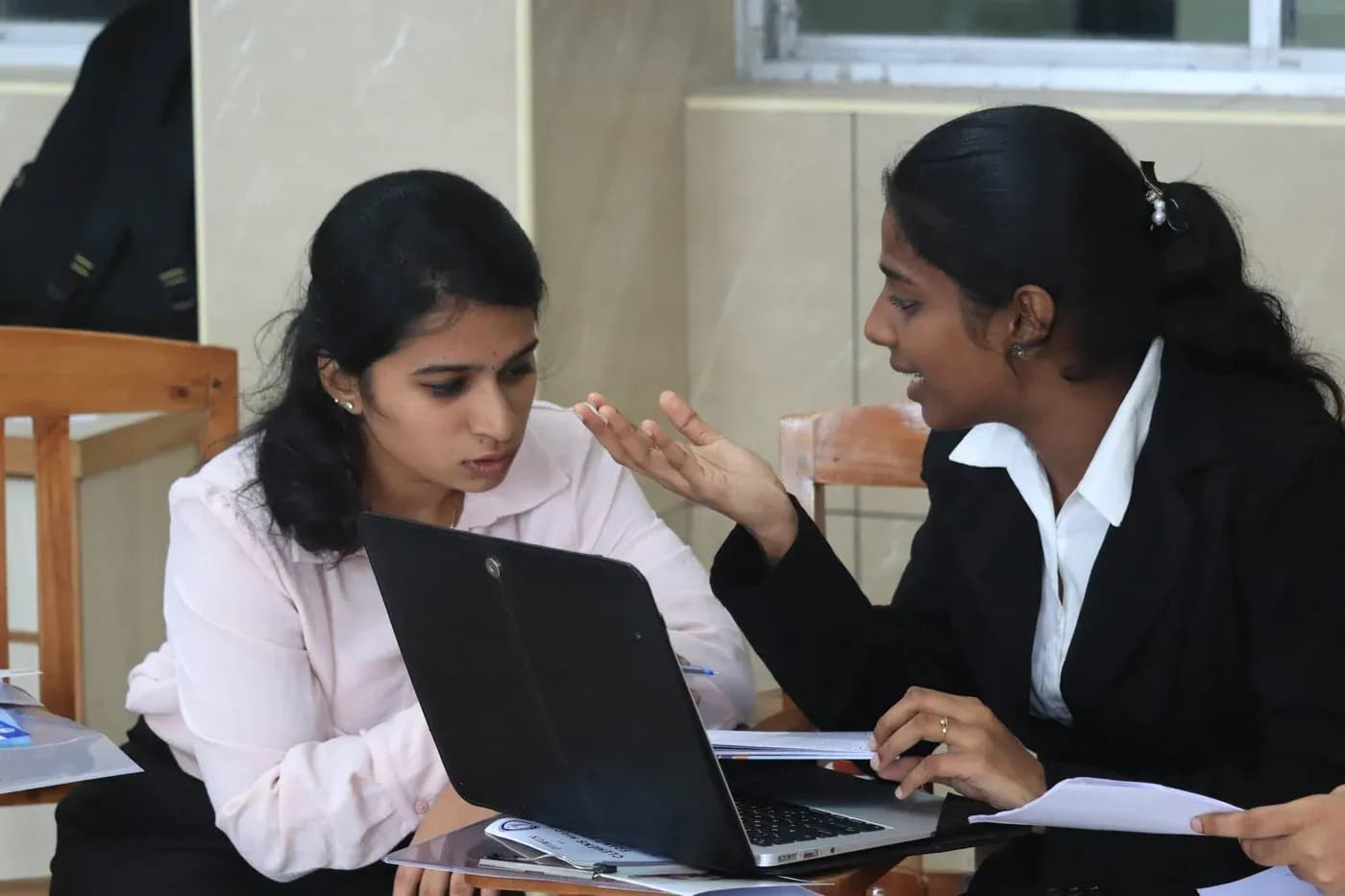 Delegates drafting working paper and resolutions collaboratively